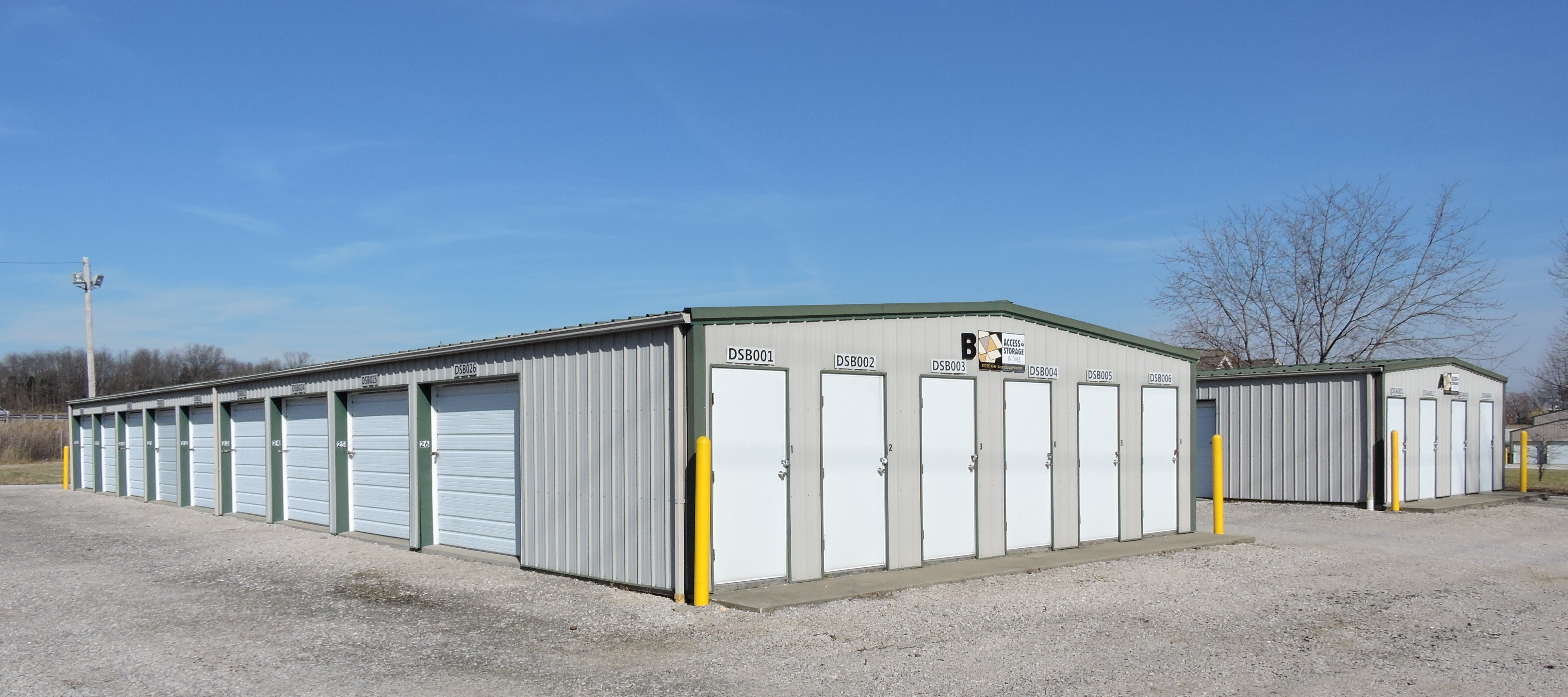 Access Storage in Dale, highlighting white-door drive-up units and secure, covered storage for RVs.